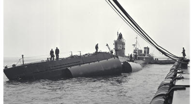 Submarine U3 in three parts under tow at Kockums Malmö.
