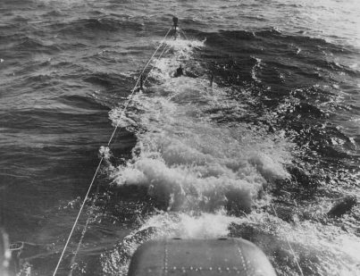 Submarine U3 diving. Air is escaping from forward main ballast tanks.