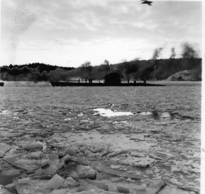 Submarine U3 under tow in the ice.